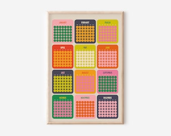 May include: A framed wall art print featuring a colorful calendar design. Each month is represented by a different color and a grid of dots. The months are labeled across the top and bottom of the print.