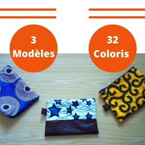 May include: Three different zippered pouches with various colorful patterns. The pouches are made of fabric and have a zipper closure. The text "3 Modèles" and "32 Coloris" is visible in the image.