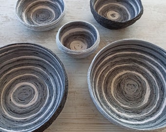 Gray and white spiral baskets, handmade from upcycled wool and hardened in a natural way