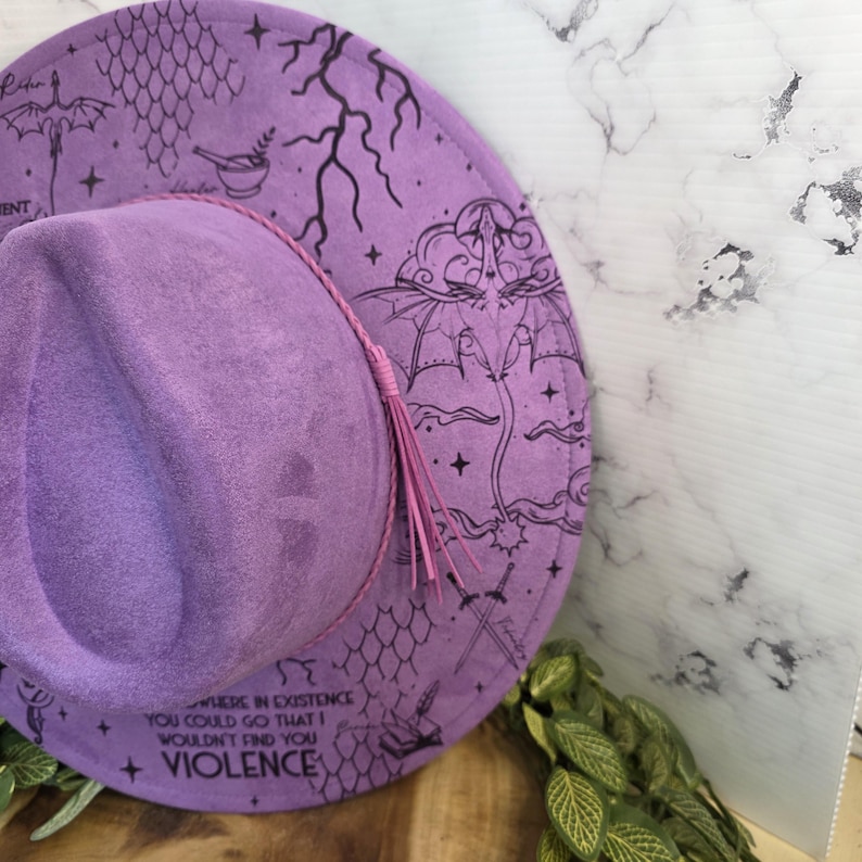 Fourth Wing dragon-rider design Wide Brim Hat in a flat-lay shot, a romantasy reader bookish gift.