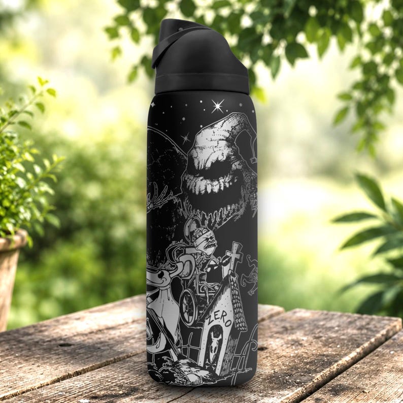 Laser engraved black stainless steel tumbler featuring spooky holiday-inspired characters, pumpkins, haunted scenes, and gothic wraparound artwork in a detailed silver engraving design.