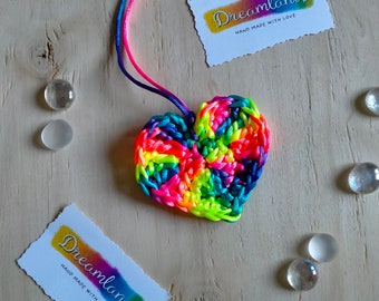 Multicolored heart-shaped decoration, handmade crochet. Made of 100% polyester rope.