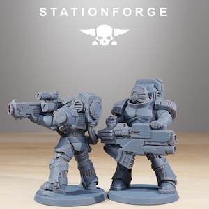 May include: Two grey plastic miniature figures of space warriors, one holding a large gun and the other holding a smaller gun. The figures are standing on grey bases.