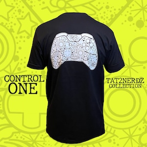 CONTROL ONE part of our (TAT2NERDZ) Collection on a 100% Cotton lightweight black short sleeve T-shirt.
