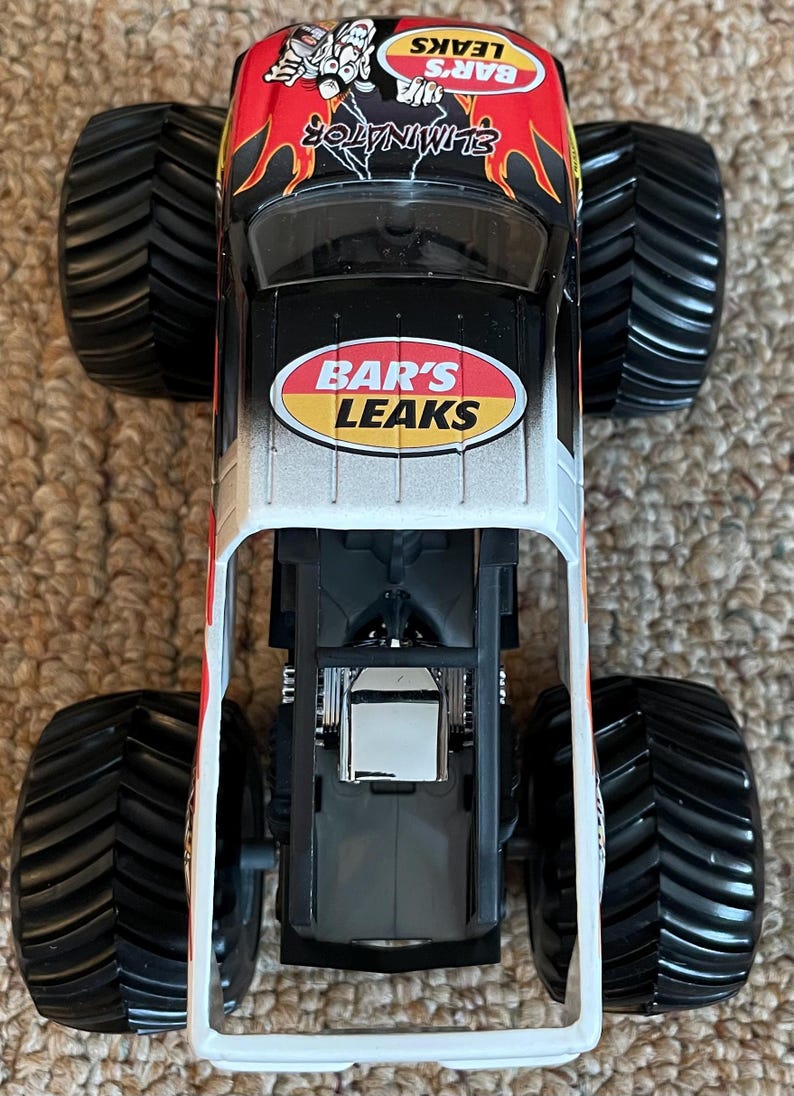 Camión Monster Jam Eliminator Bar's Leaks con carrocería de metal fundido a presión - Escala 1:24 Mattel imagen 9