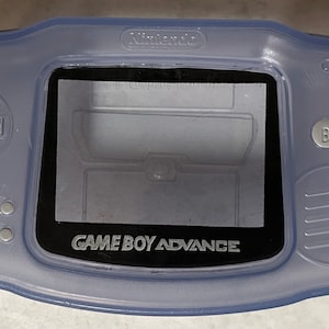 Nintendo Game Boy Advance 2002 Atomic Purple żelkowe etui cukierkowe
