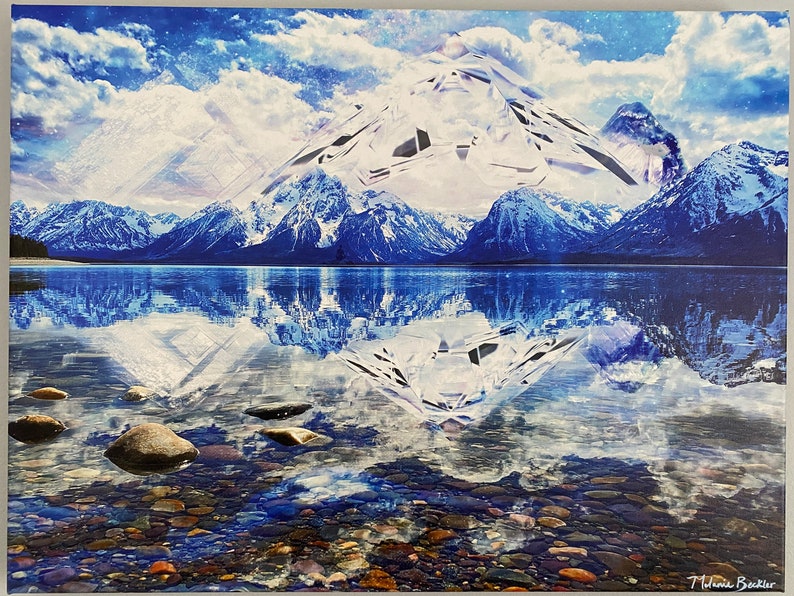 May include: A painting of a snow-capped mountain reflected in a still lake. The water is a deep blue and the sky is a light blue with white clouds. The mountain is a white and gray color with a few dark blue accents. The lake is surrounded by a rocky shore with small rocks and pebbles.
