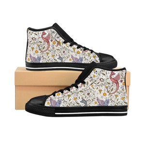 May include: Black high-top canvas shoes with a white background and a pattern of red, yellow, and blue dragons and floral designs.