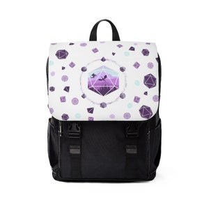 May include: A black backpack with a white zipped flap. The flap features a purple and white design of a 20-sided die with a dragon flying over a mountain range. The background is covered in a pattern of smaller purple and white dice.