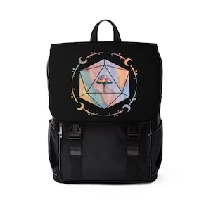 May include: Black backpack with a colourful, geometric design featuring a mushroom inside a 20-sided die. The design is surrounded by a circle of stars and crescent moons.