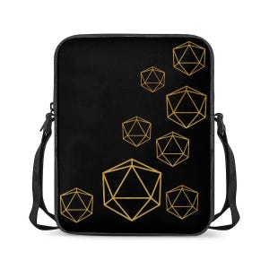 May include: Black messenger bag with a gold geometric design. The bag displays gold polyhedral shapes on a black background. Includes a black adjustable shoulder strap.