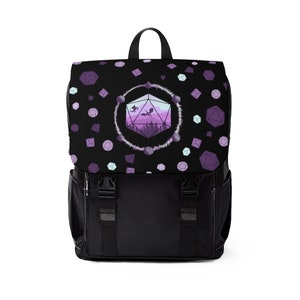 May include: Black backpack with a purple and white dice pattern. The dice has a mountain landscape inside and a dragon flying above it.