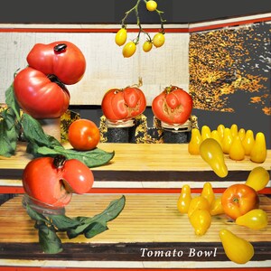 May include: A bowl of red tomatoes with yellow tomatoes hanging from a branch above. The bowl is on a wooden surface with a yellow and red striped background. The text "Tomato Bowl" is printed on the surface.