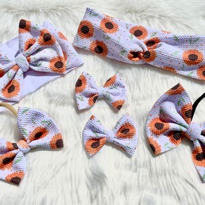 LC Bows en Girasoles