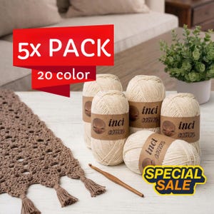 May include: A set of three ceramic mugs with a speckled, matte finish. The mugs are in shades of cream, light gray, and dark gray. Each mug has a simple, minimalist design and a rounded handle.