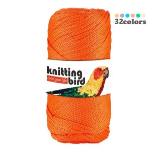 May include: A bright orange ball of yarn with the label "knitting bird color your life" and a parrot illustration. The label also says "32 colors".