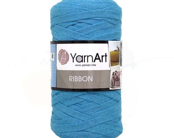 May include: A skein of turquoise blue yarn art ribbon. The yarn is made of a soft, woven fabric and is perfect for crafting projects. The label on the skein reads "YarnArt Ribbon" and "www.yarnart.info".