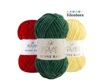May include: Three skeins of yarn in red, green, and yellow. The yarn is soft and fluffy, and it is labeled "Bunny Baby" and "Wolans Yarn". 52 colors are available.