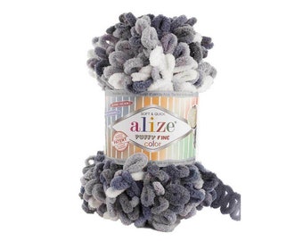 May include: A skein of Alize Puffy Fine yarn in a gray, white, and blue color combination. The yarn is soft and quick to work with. The label reads "Soft & Quick Alize Puffy Fine Color".
