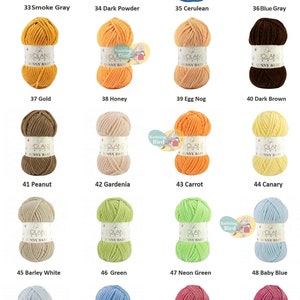 May include: A collection of 52 yarn skeins in various colors, including smoke gray, dark powder, cerulean, blue gray, gold, honey, egg nog, dark brown, peanut, gardenia, carrot, canary, barley white, green, neon green, baby blue, powder blue, sky blue, hot rose, and rouge. Each skein is labeled with the brand name "WOLANS" and the words "Bunny Baby".