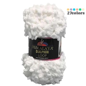Peut inclure: Un peloton de fil blanc Himalaya Dolphin Loop. Le fil est un fil bouclé texturé et moelleux. L'étiquette sur le fil indique "Himalaya Dolphin Loop".