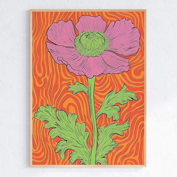 May include: A framed art print featuring a stylized pink flower with a green center and stem, set against a vibrant orange and yellow swirled background. The artwork has a retro, psychedelic aesthetic.