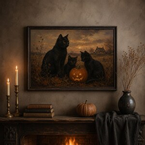 Black cats with a glowing jack-o'-lantern print above a mantel with candles — vintage Halloween decor printable, dark moody fall art download.