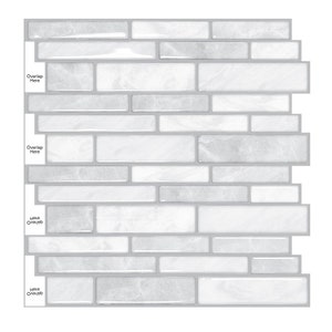 May include: White peel and stick tile backsplash with a marble look. The tiles are arranged in a staggered pattern. The tiles are labeled "Overlap Here" in the corners.