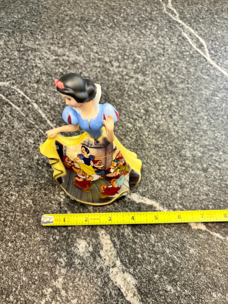 The Bradford Editions Disney's Dresses and Dreams Bell, forever Snow