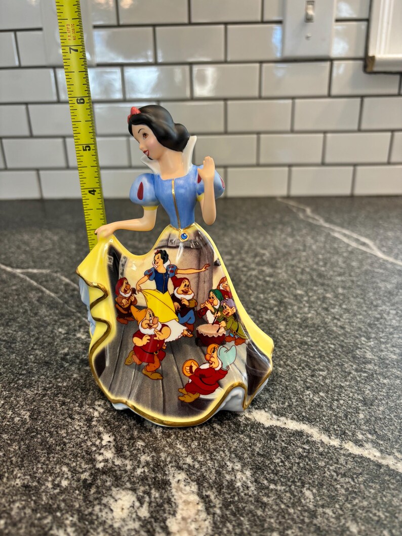 The Bradford Editions Disney's Dresses and Dreams Bell, forever Snow