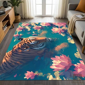 May include: A rectangular rug depicting a tiger in a teal pond with pink and yellow lotus flowers. The tiger has orange and black stripes. The rug is a decorative home decor item.