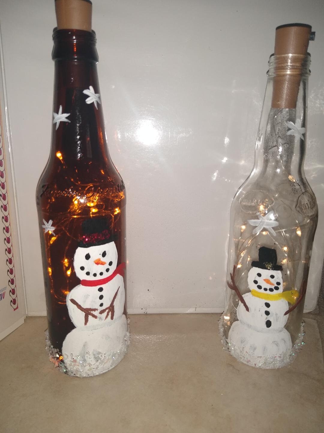 Muñecos con botellas on sale