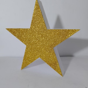 Natale Forma Stella a 5 Punte Glitterata Oro in Polistirolo Altezza 30 cm Spessore 5 cm. Glitterata Oro su 1 solo lato Artigianale
