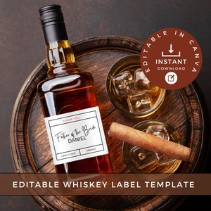 May include: Editable whiskey label template with a brown background and a bottle of whiskey with a label that says "Father of the Bride Daniel" with the date June 17, 2025 and the location Jamaica. The label is white with black text and a red line under the name Daniel. The bottle is sitting on a wooden barrel with two glasses of whiskey and a cigar.