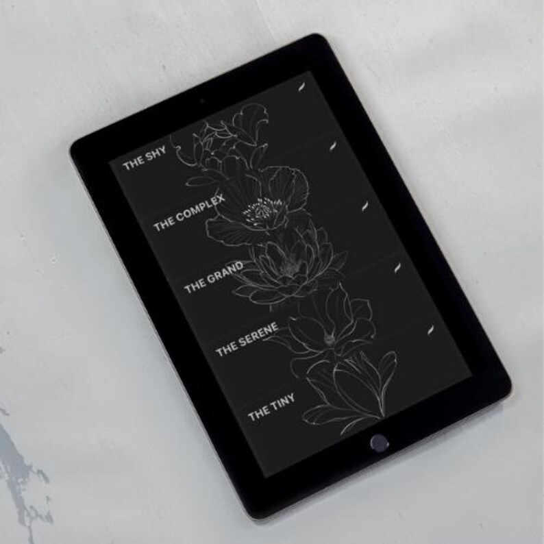 May include: A black tablet screen displays a white floral design with the text "The Shy", "The Complex", "The Grand", "The Serene", and "The Tiny" on a black background.