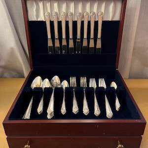 Rogers and Bro Silverware Set 48 Pieces Set of 8 in Wood Case with Drawer & Navy Blue Velvet Lining