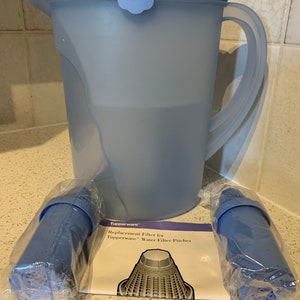 Clear Blue Tupperware Impressions 1 gallon Pitcher Water Filtration Jug  2001 Comes with 2  NIP Filters 4433A-1, 4477A-2, 4478A-1