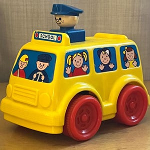 Vintage 1988 Shelcore Yellow School Bus with stationary driver. Kindergarten Toys