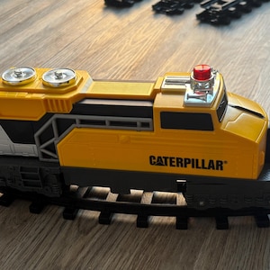 Toy State CAT Bauzug Batteriebetrieben mit Lokomotiven Licht