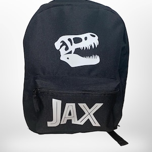 Dinosaurier-Kind-Rucksack-Reise-Tasche personalisierte Vorschulgrundschul-T-Rex Flugzeug-Themenpark-Rucksack