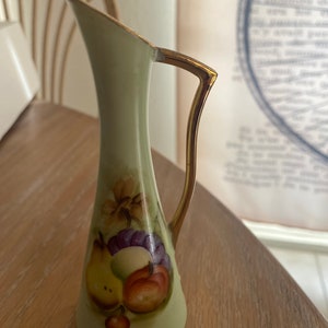 Figurine vintage pichet gauche