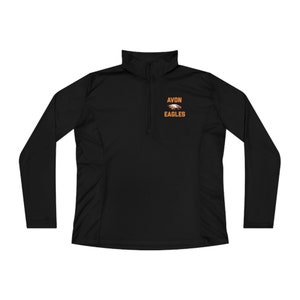 May include: Black long-sleeve performance shirt with a quarter zip closure. The shirt has an embroidered logo with the text "AVON EAGLES" and a graphic of an eagle.