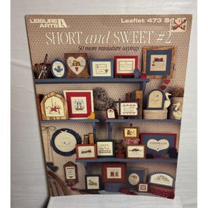 Leisure Arts Short And Sweet #2 Ulotka 473 Wzory do haftu krzyżykowego Mini powiedzenia