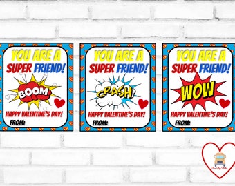 May include: Three printable Valentine's Day cards with a superhero theme. Each card features a different comic book style word bubble with the text "BOOM", "CRASH", and "WOW". The cards say "You are a Super Friend!" and "Happy Valentine's Day!"