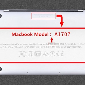 May include: Close-up of the bottom of a silver laptop with the text "Macbook Model: A1707" printed on the back. The text "Designed by Apple in California Assembled in China Model A1707 EMC 3162 Rated 20.2V 4.3A max. FCC ID: BCGA1707 and IC: 579C-A1707 CAN ICES-3 (B)/NMB-3(B) Serial C02V28DUHTD6" is also printed on the back. The laptop has the following certifications: FCX AOCE.