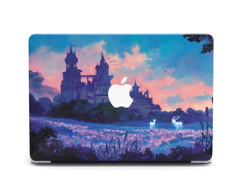 May include: A laptop skin with a colorful illustration of a castle in a field with a sunset sky. The castle is silhouetted against the sky and there are two white deer in the field. The Apple logo is in the center of the image.