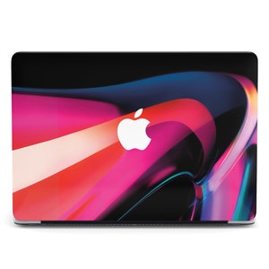 May include: A black laptop with a colourful abstract design on the lid. The design features swirls of pink, red, blue, and white. The Apple logo is in the centre of the lid.
