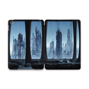 May include: A futuristic city scene viewed through three windows, with a dark gray interior and a few pillows in the foreground.