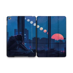 May include: A dark blue phone case with a cityscape and a crescent moon in the background. A silhouette of a person is sitting in a window looking out at the moon.