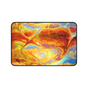 May include: Abstract art print featuring a swirling pattern of yellow, orange, red, blue, and green colors. The colors blend together to create a unique and eye-catching design.